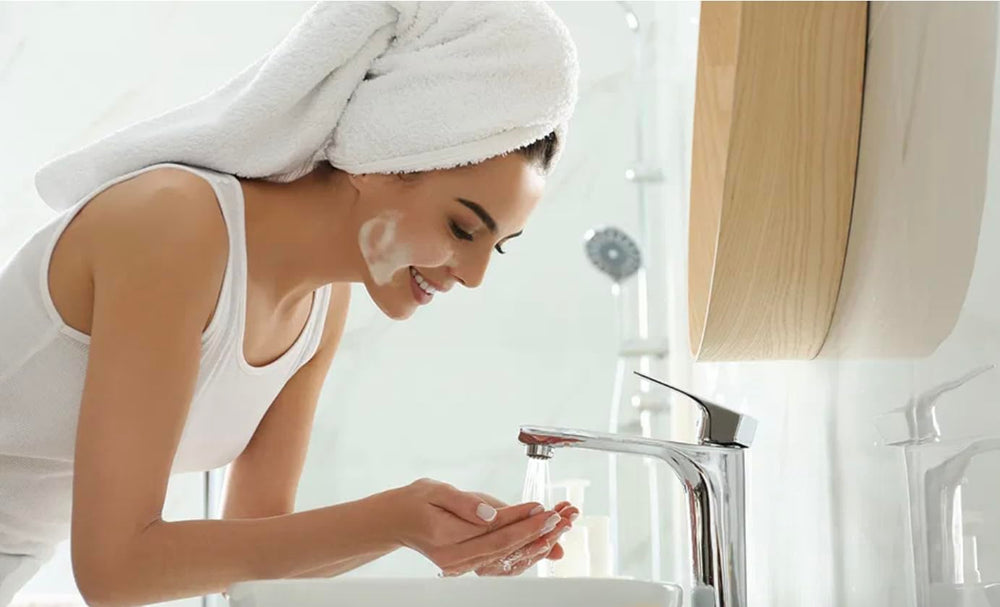 Dove Cream Beauty Bar pack in hotel bathroom setup for daily use.