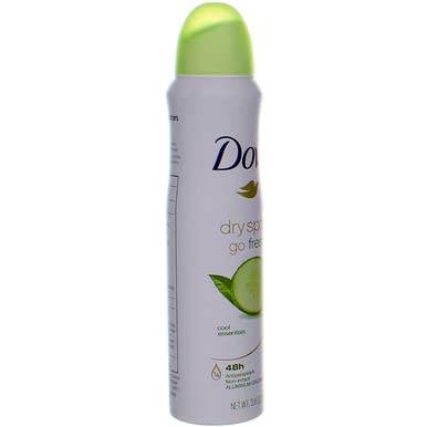 Dove Dry Spray Cool Essentials packaging in a bathroom setting.