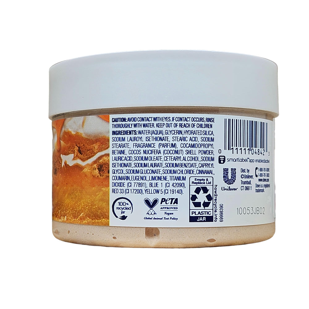 Dove exfoliante corporal navideño, aroma cálido para un ritual relajante.