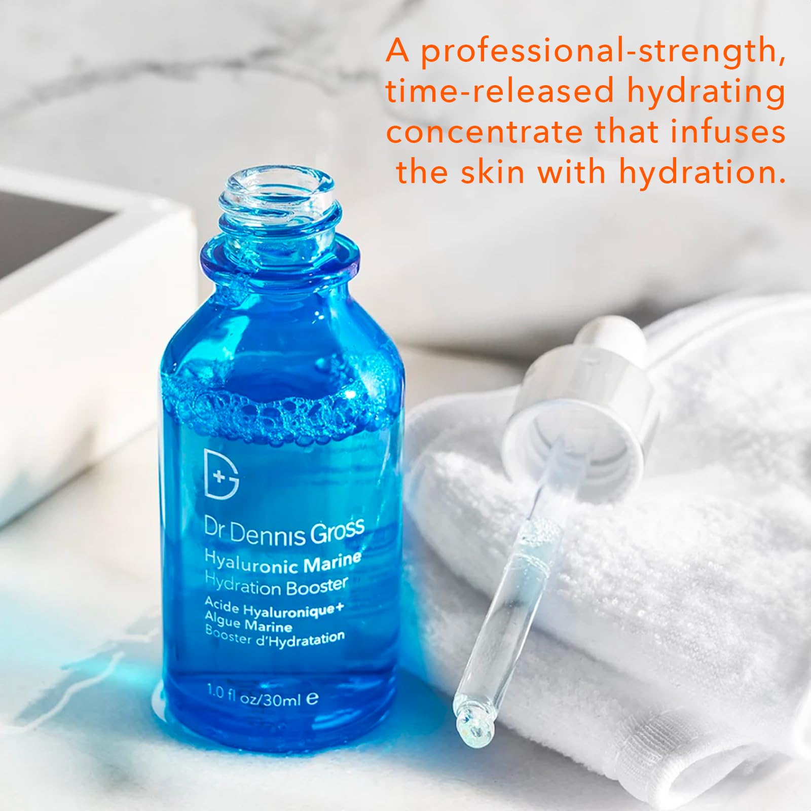 Dr Dennis Gross Hyaluronic Marine Hydration Booster — application visage idéale pour peau douce et fraîche.