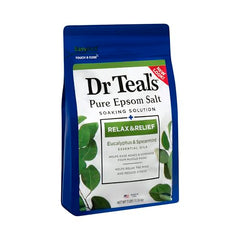 Dr Teal's botella de sal de epsom con etiqueta visible.
