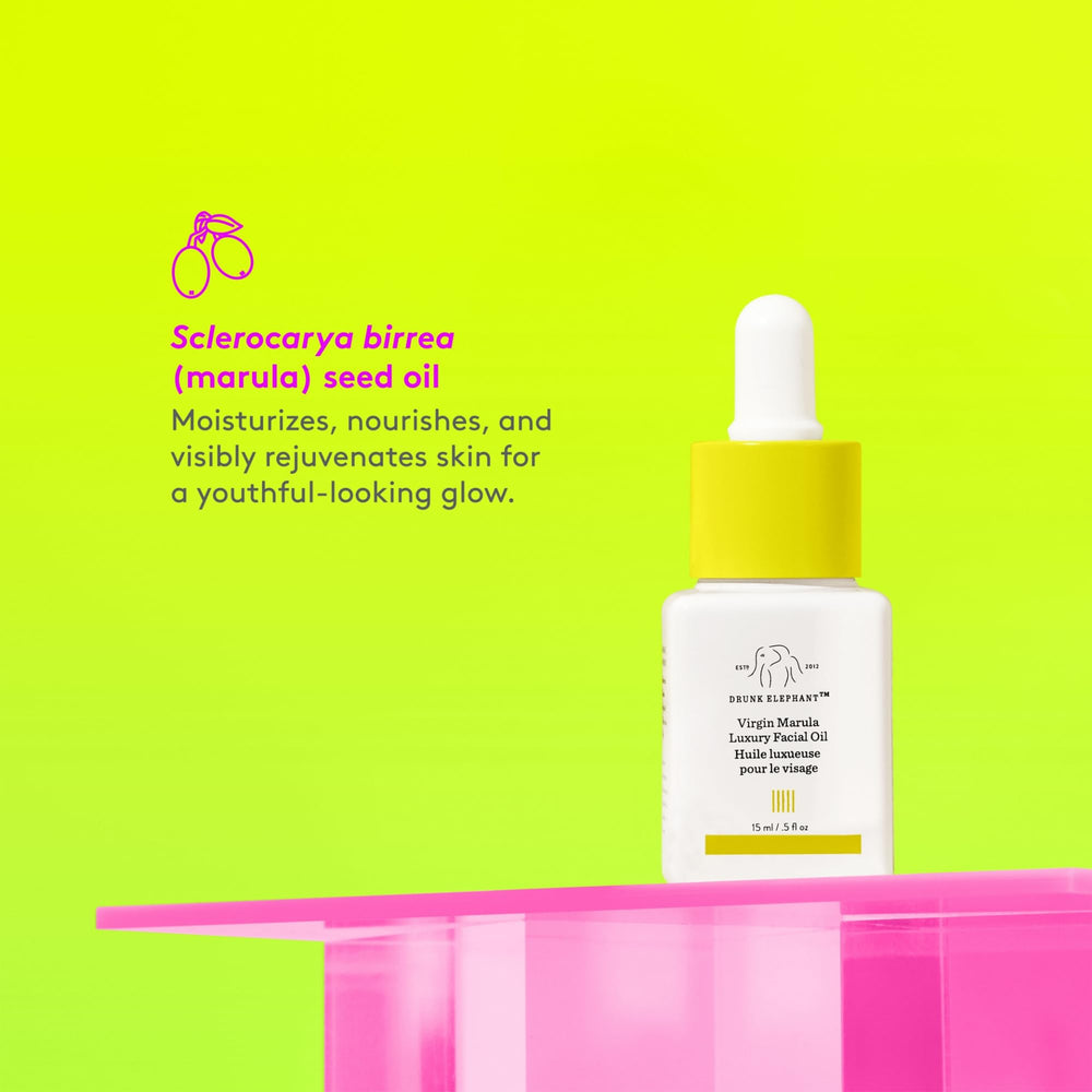Drunk Elephant virgin marula aceite, aplicación en cara para hidratación rápida
