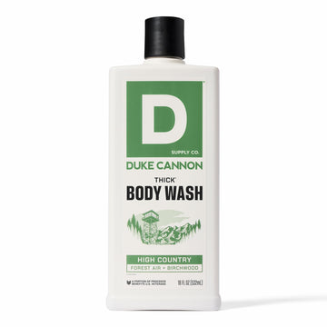 Duke Cannon High Country bottle pour showing thick viscosity for a rich wash.