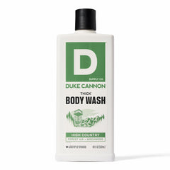 Duke Cannon High Country bottle pour showing thick viscosity for a rich wash.