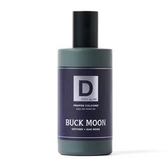 Buck Moon cap closeup highlighting lime and vetiver notes.