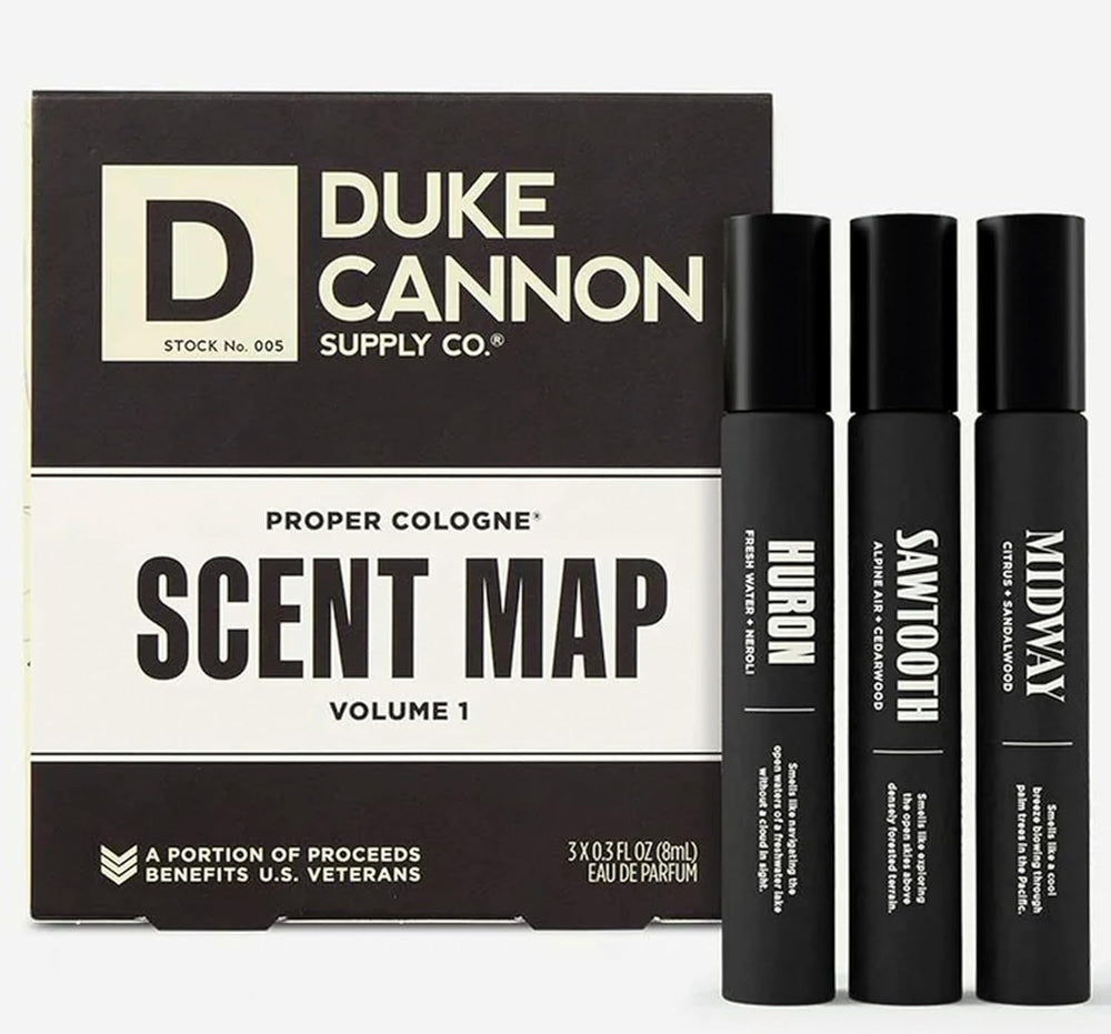 Duke Cannon Proper Cologne Sawtooth bottle on wood shelf, long-lasting woodsy scent.
