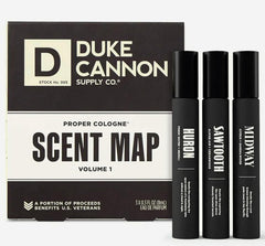 Duke Cannon Proper Cologne Sawtooth bottle on wood shelf, long-lasting woodsy scent.