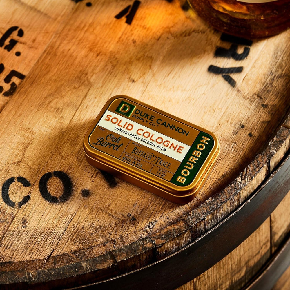 Duke Cannon travel tin sits on desk for quick refresh.