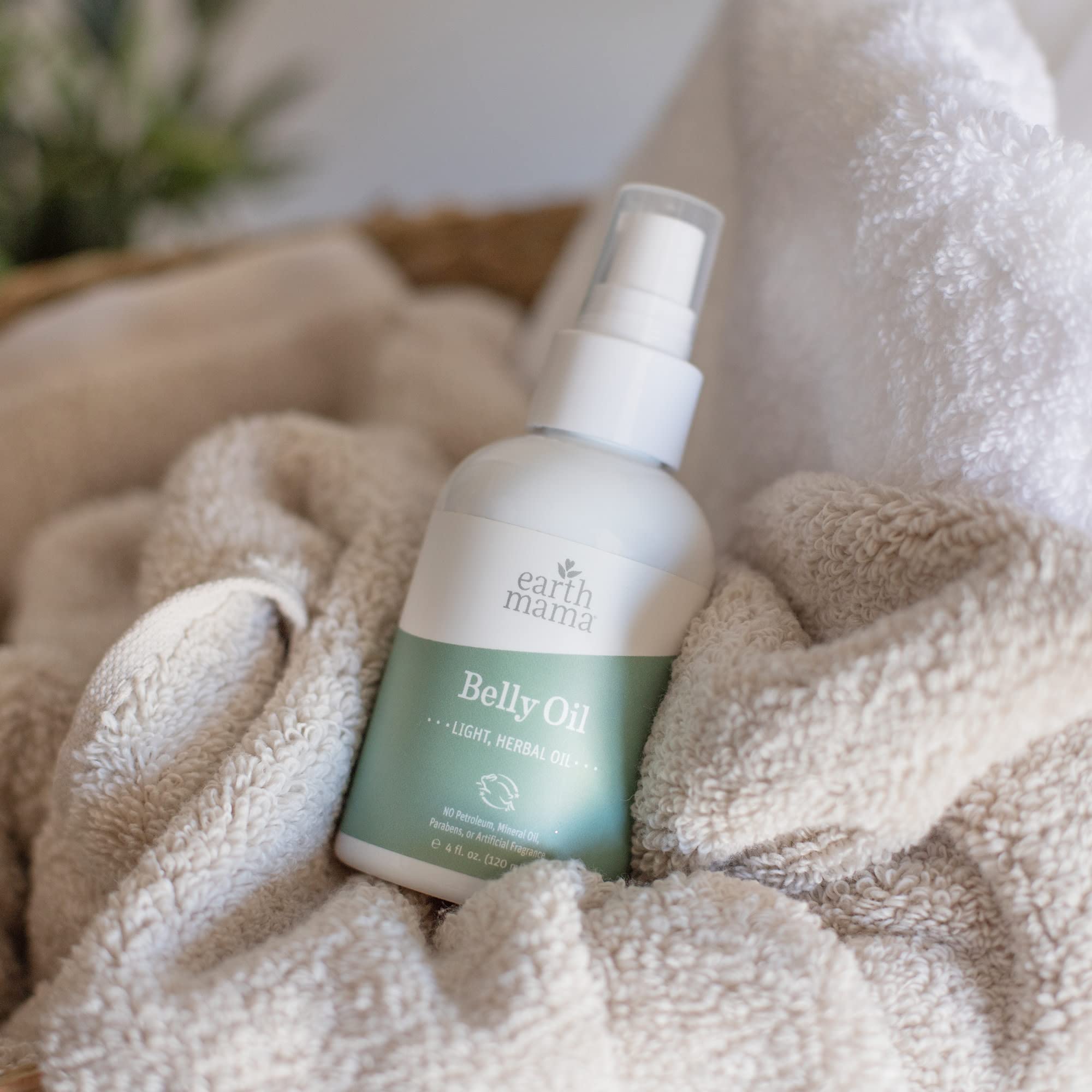 Earth Mama Belly Oil para abdomen, muslos y pecho con hidratación.