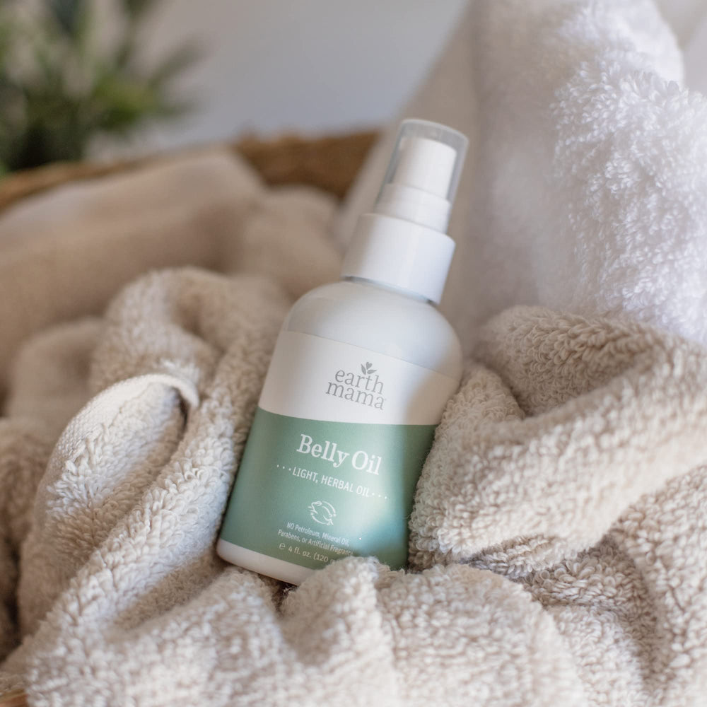 Earth Mama Belly Oil para abdomen, muslos y pecho con hidratación.