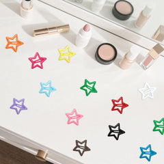 ELANE clip estrellas 32 mm, tamaño práctico para coletas rápidas.