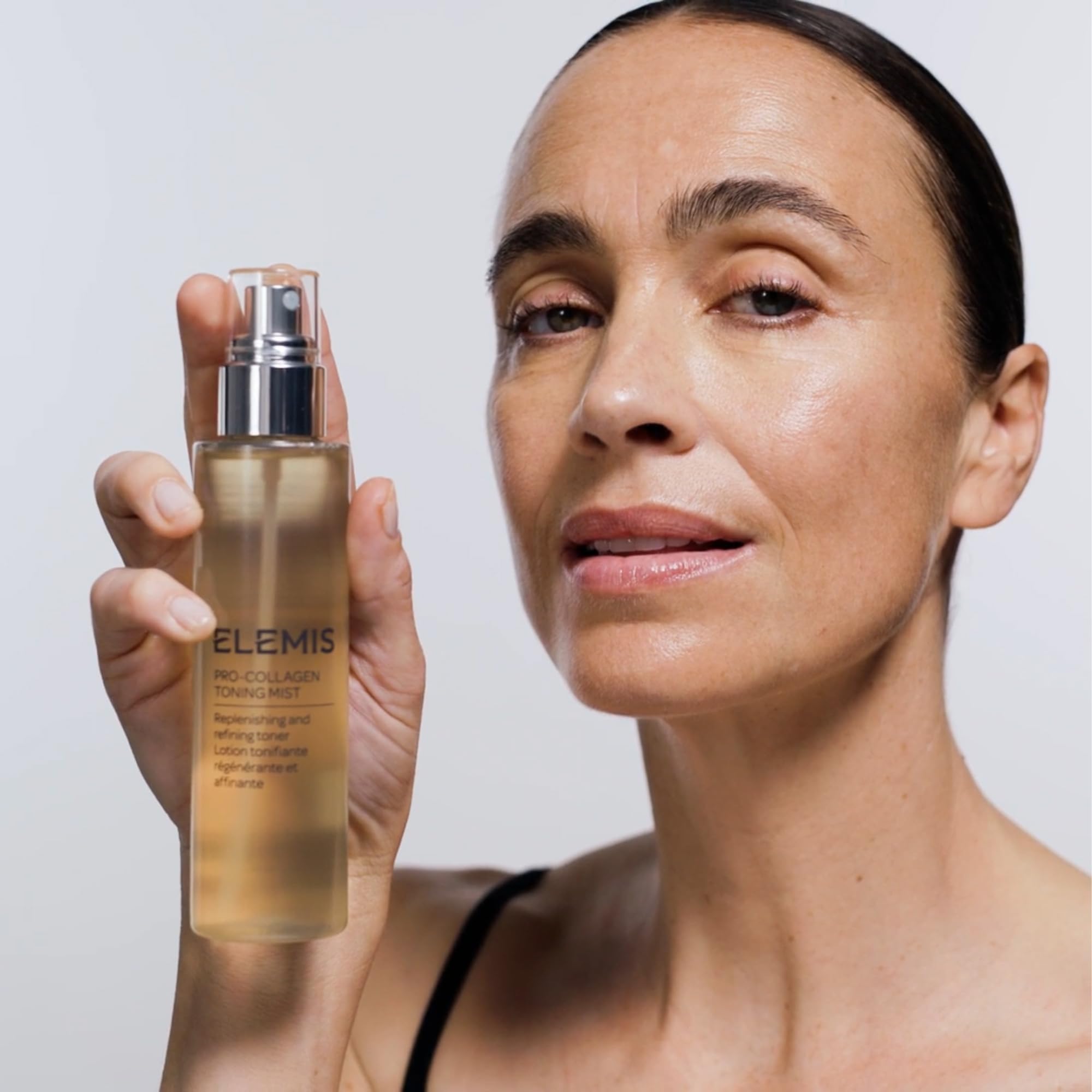Elemis Pro-Collagen Toning Mist cotton pad application tones and prepares skin