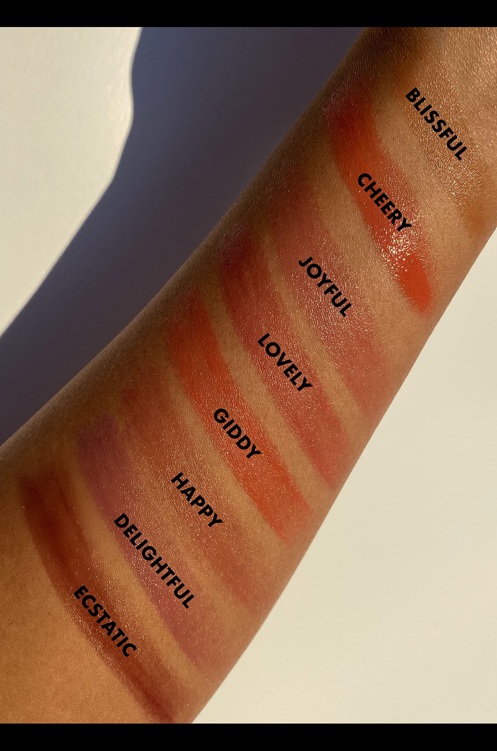e.l.f. Brillo labial tono malva: color suave y brillo sutil.
