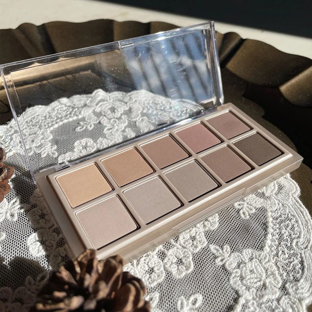 Erinde paleta compacta con brocha doble para viajar.