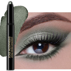 Sombra de ojos Erinde crema verde oscuro con brillo para un acabado intenso.