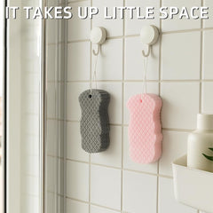Esponja exfoliante mágica para baño con textura exfoliante suave.
