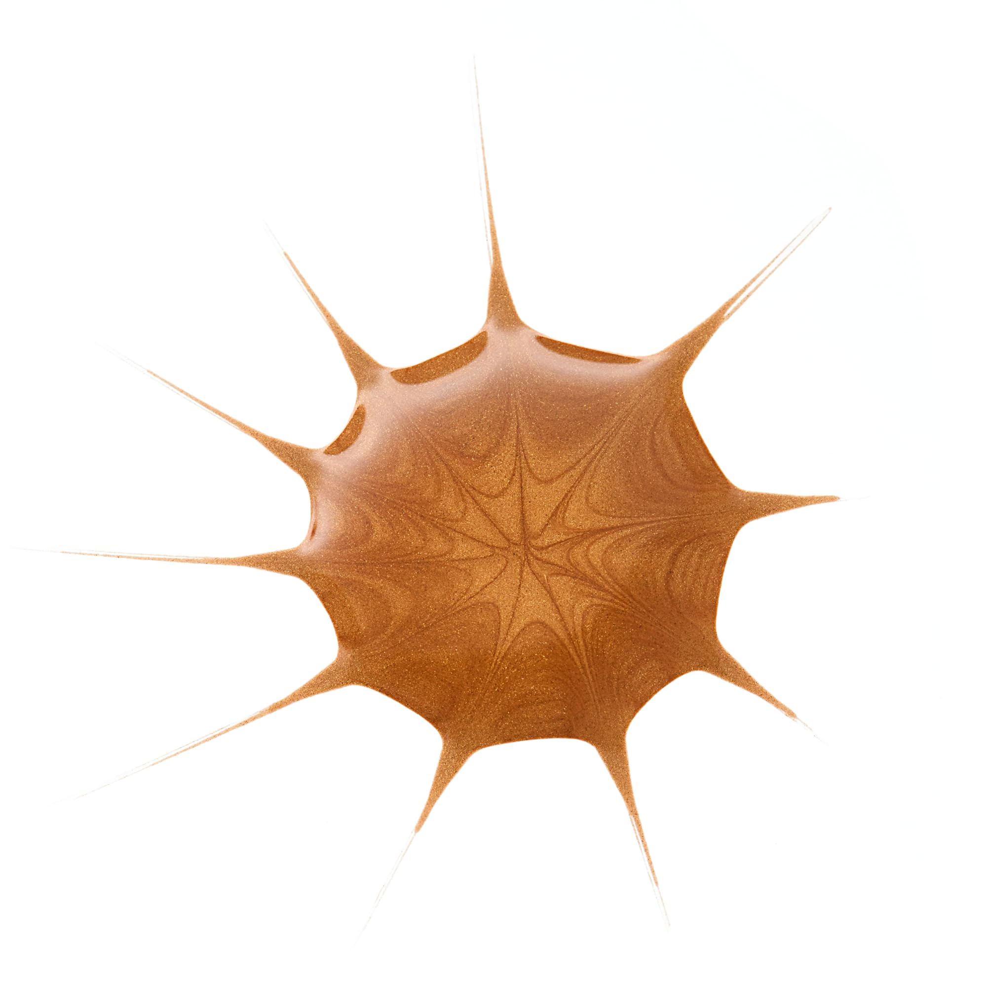 Textura ligera de las gotas bronceadoras sobre la piel