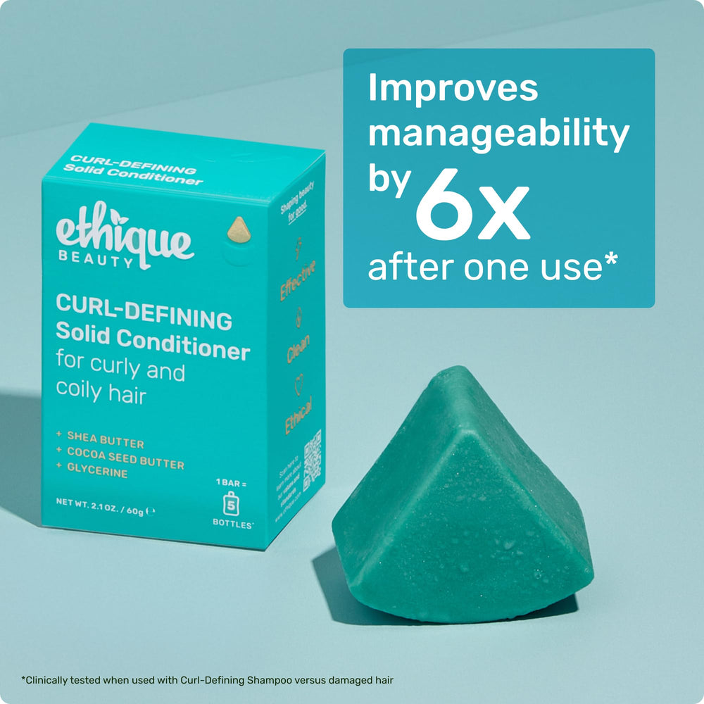 Ethique Curl-Defining Bar being used on wet hair to condition curls