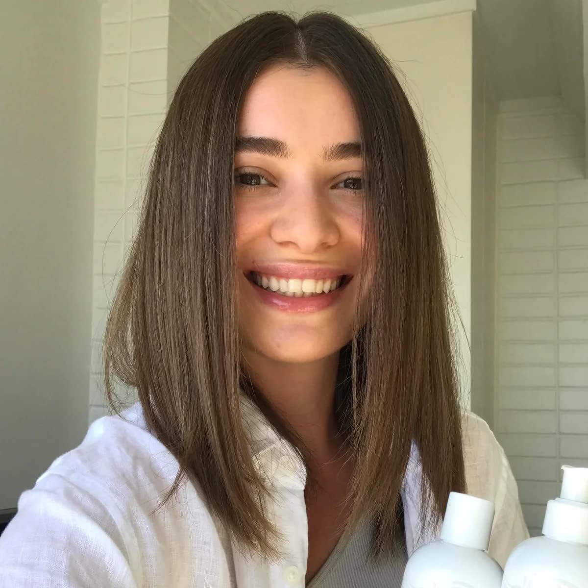 EVOLVh UltraShine sur cheveux mouillés, démêlage facilité après chaque lavage.
