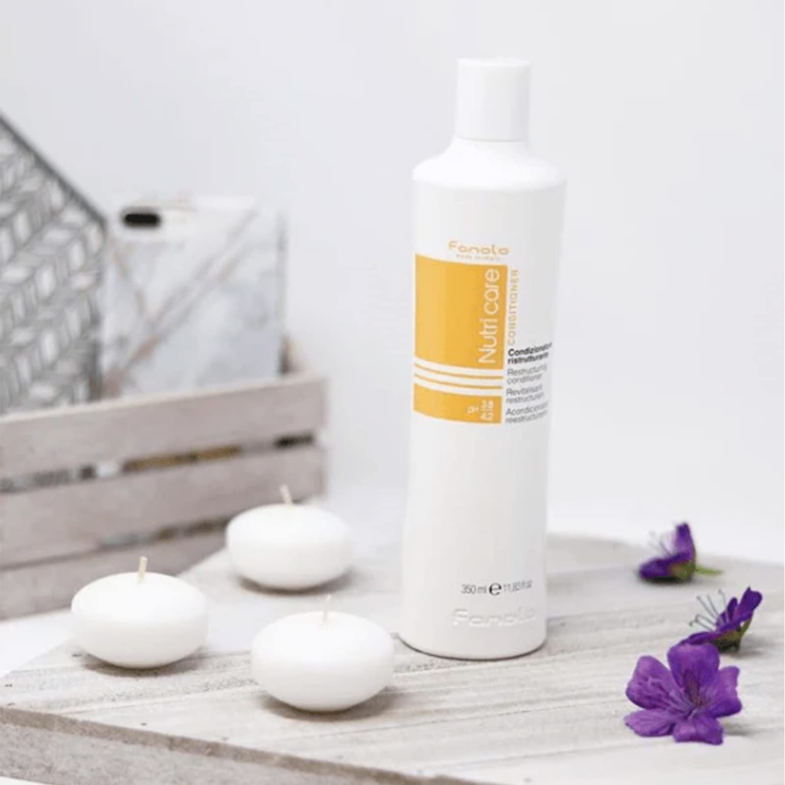 Envase y etiqueta de Fanola Restructuring, diseño práctico para baño
