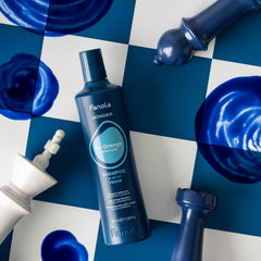 Fanola Wonder No Orange Blue Shampoo – texture crème: application douce pour cheveux colorés.