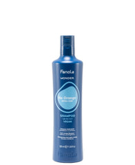 Fanola Wonder Sin Naranja: botella azul neutralizando tonos cálidos en cabello tratado.