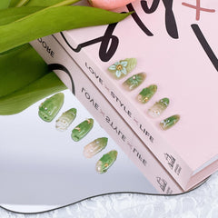 Uñas FDSQHSA almendra con flor veraniega para estilizar cualquier outfit