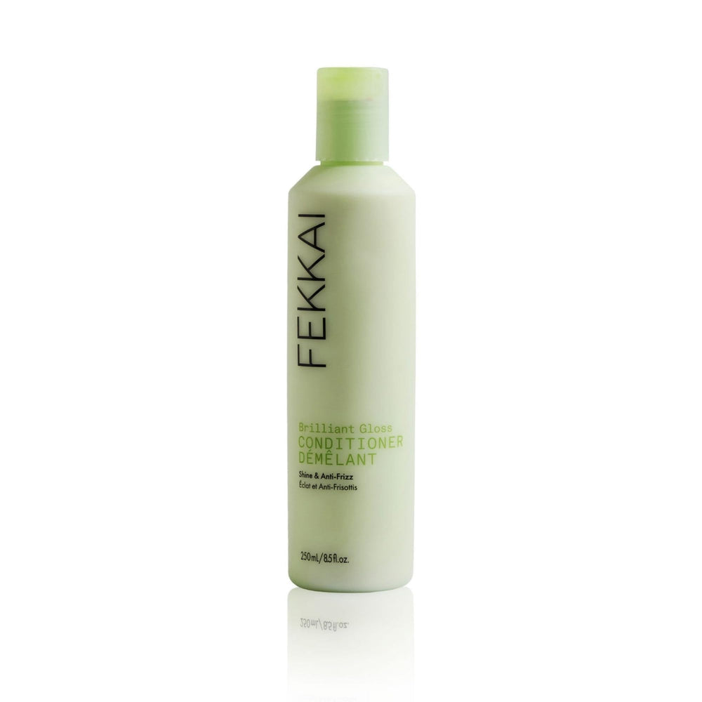 FEKKAI Brilliant Gloss Conditionneur: bouteille lumineuse pour hydratation et brillance des cheveux.