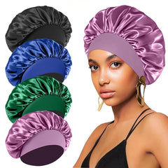 Gorra FIRSTPELLA en negro, bonete de seda satin para dormir suave y cómodo.