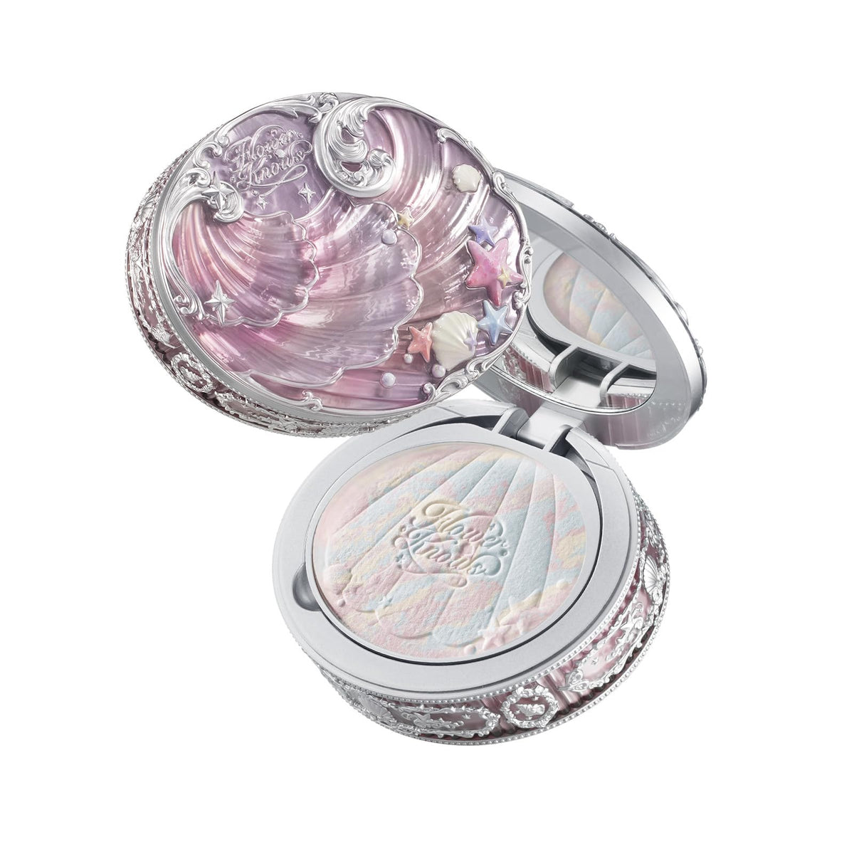 Flower Knows Shells Jewel Polvo compacto rosado con espejo para retoques rápidos.