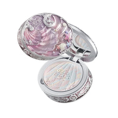 Flower Knows Shells Jewel Polvo compacto rosado con espejo para retoques rápidos.