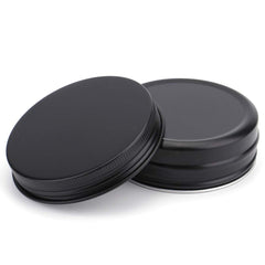 Pilules Foraineam dans tin noir mat, rangement compact.