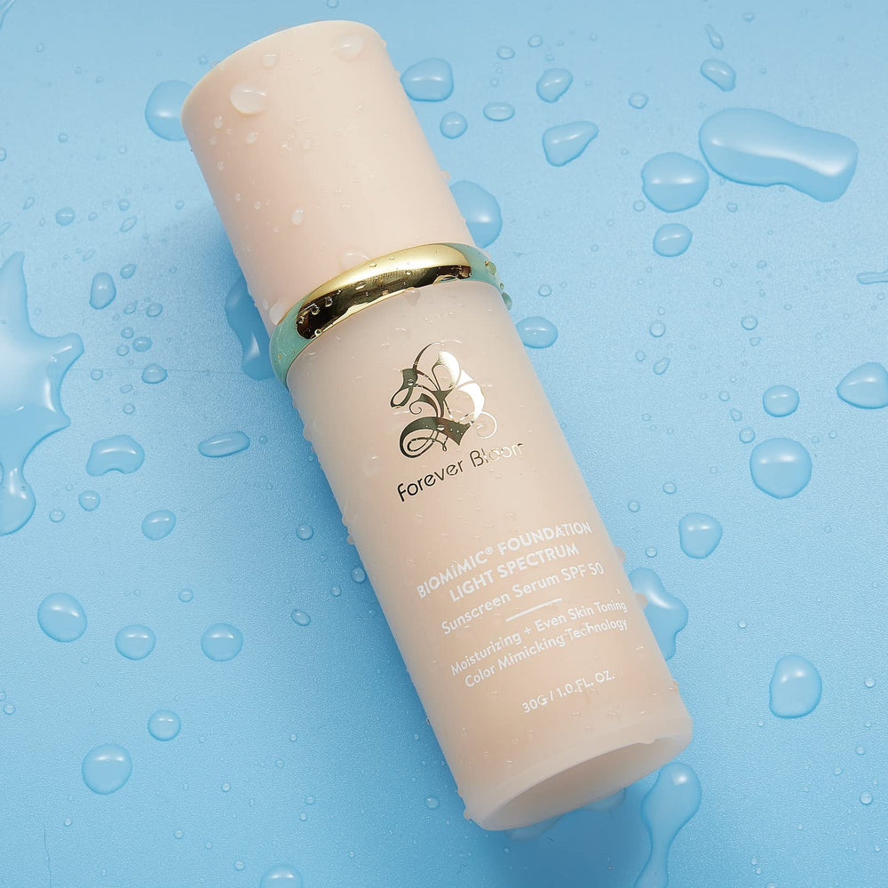 Emballage Forever Bloom Bio Mimic Foundation avec SPF50, protection et éclat.