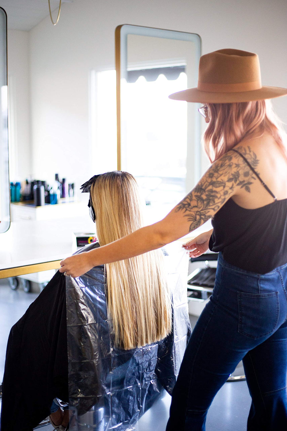 Framar proteccion-cliente-capa-peluqueria-desechable: protección fiable durante el servicio.