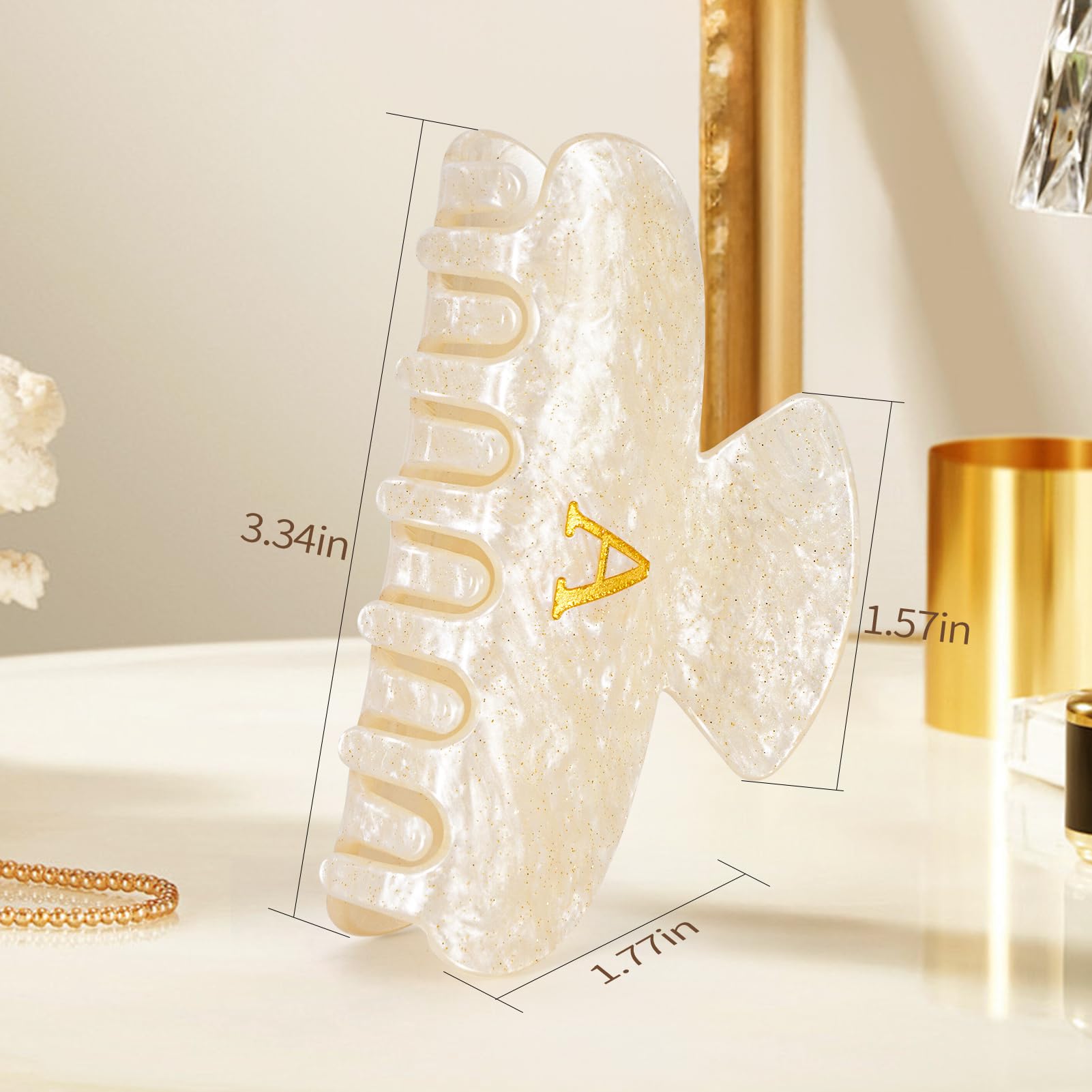 Detalle de brillo acrílico en la pinza para peinados glamorosos.