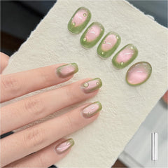 GAOY esmalte gel ojo de gato verde-rosa en una botella brillante.