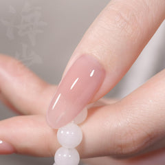 GAOY Esmalte gel translúcido rosado, curado en lámpara UV para secado rápido.