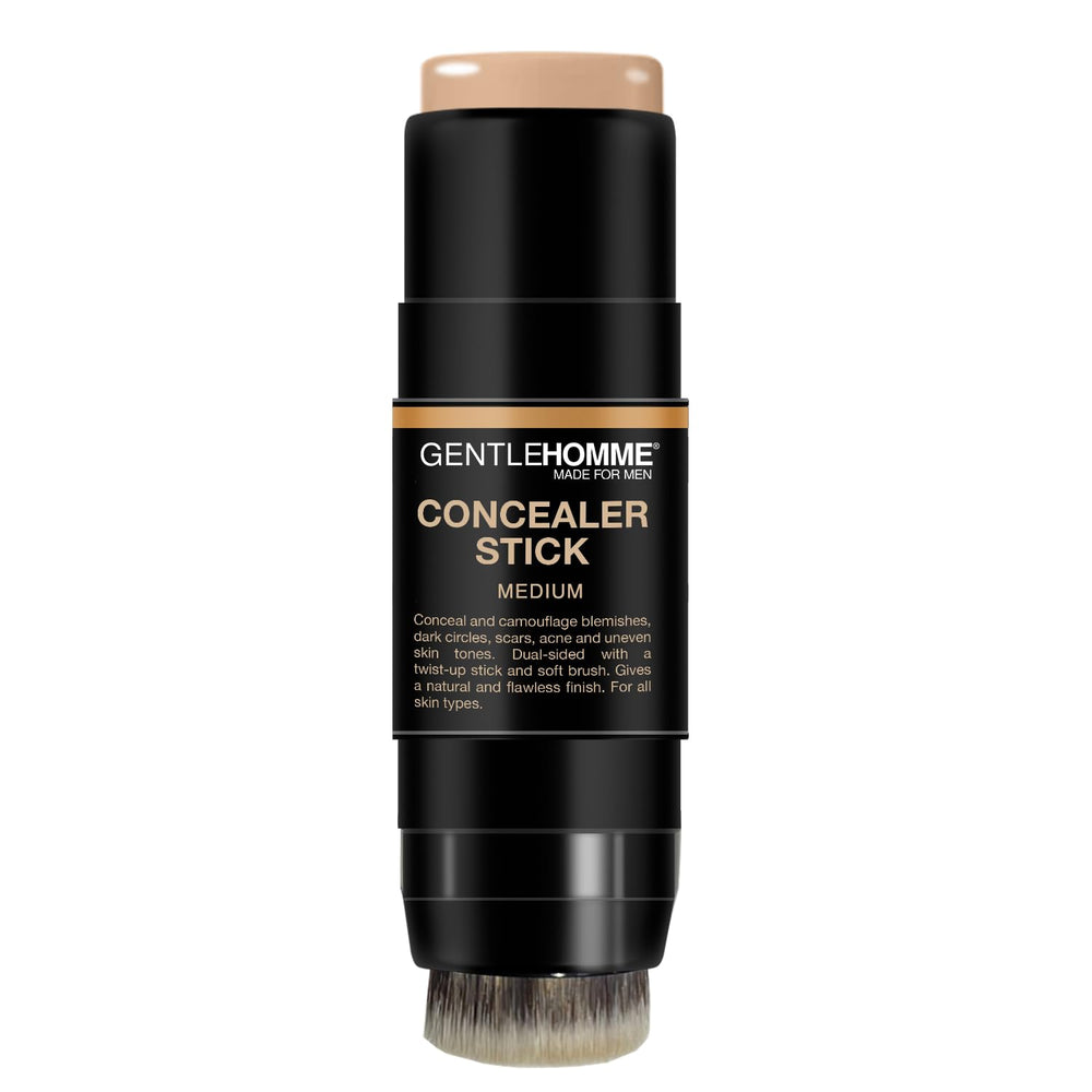 Gentlehomme Corrector Stick con brocha en uso para difuminar imperfecciones.