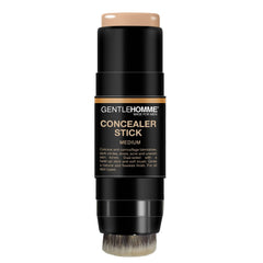 Gentlehomme Corrector Stick con brocha en uso para difuminar imperfecciones.