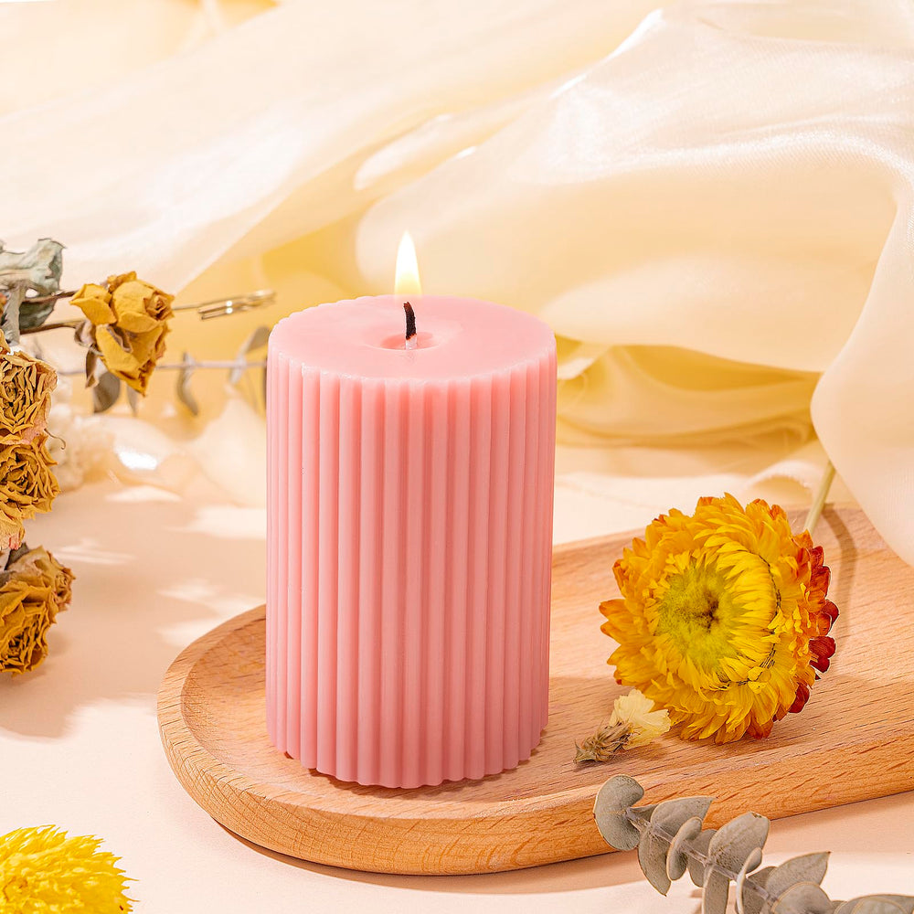 Vela de pilar rosa GiftPeak, combustión limpia para crear atmósferas relajantes