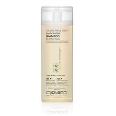 GIOVANNI Tea Tree Triple Treat Shampoo botella vertiendo para limpieza profunda y fresca