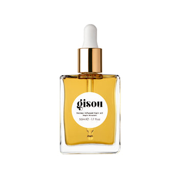 Gisou Aceite capilar miel infundido en botella para hidratación ligera.