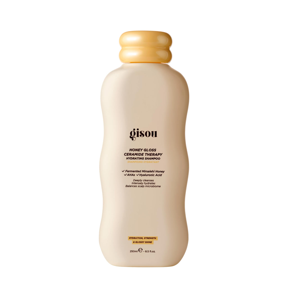 Gisou Honey Gloss Ceramide Therapy Champú: botella derramando, limpieza profunda y fragancia miel silvestre