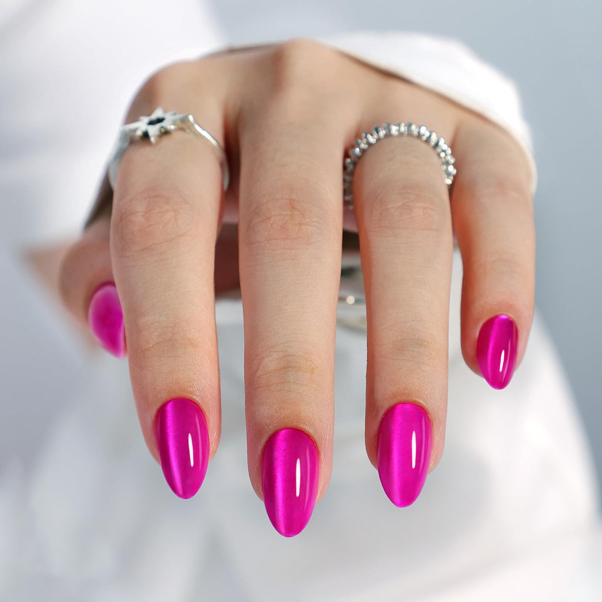 Uñas GJZEZ ojo-de-gato rosa fucsia, vista frontal, manicura rápida y duradera.
