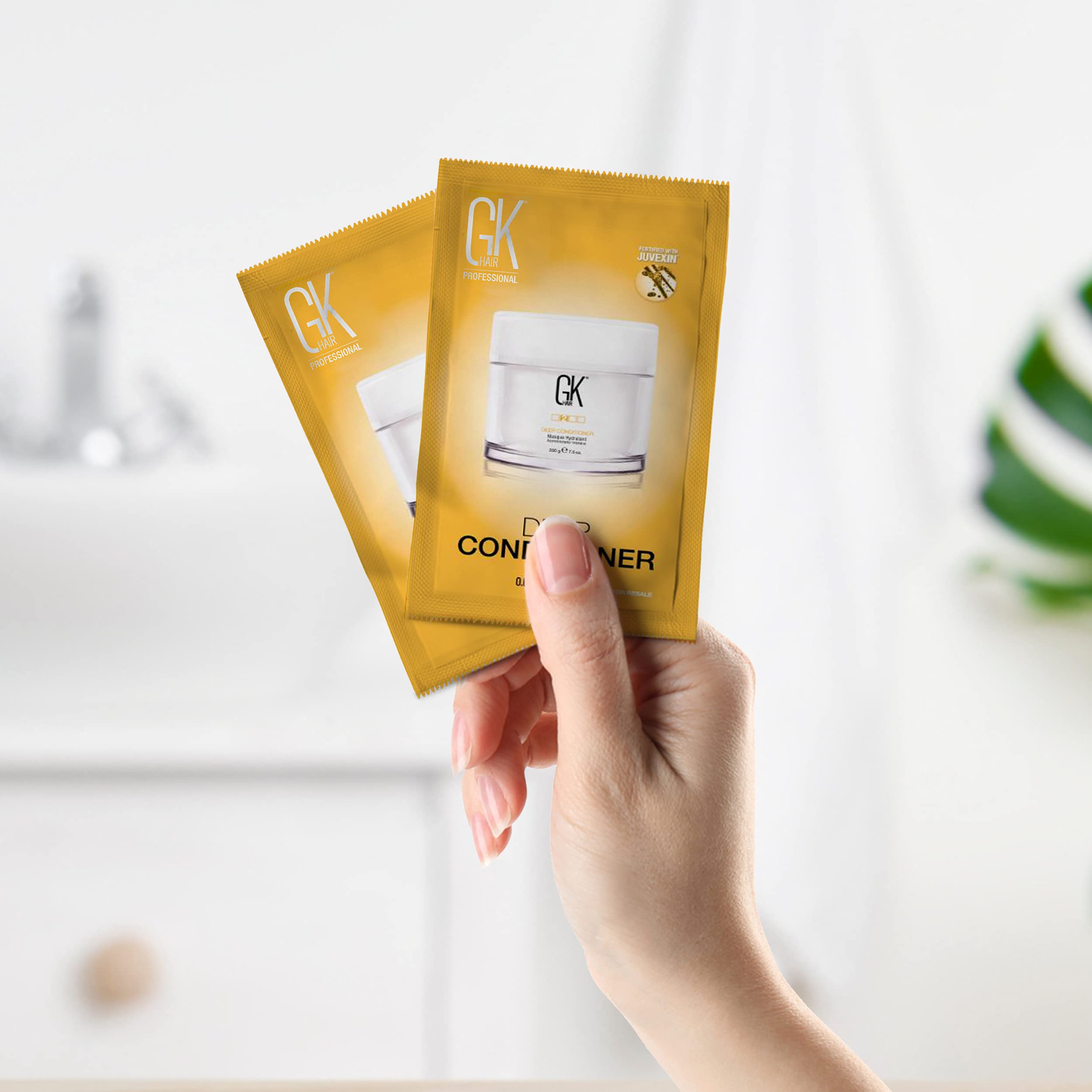Aplicación de GK HAIR en cabello dañado para suavidad y control.