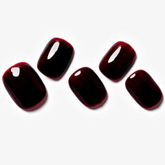 GLAMERMAID uñas cuadradas rojas vino con brillo y estilo moderno.