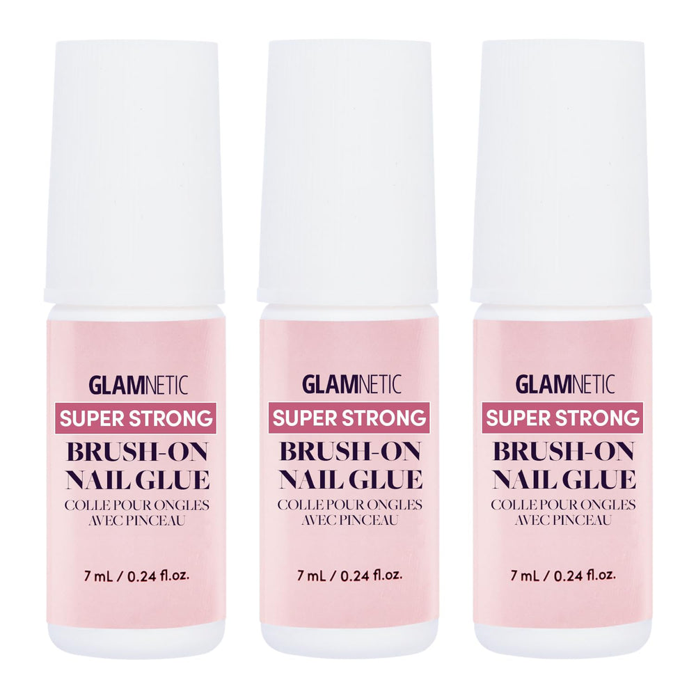 Glamnetic three-bottle brush-on nail glue set, compact and organized.