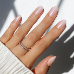 Glamnetic Crystal Glaze nude ombre short oval nails with pearlescent gloss.