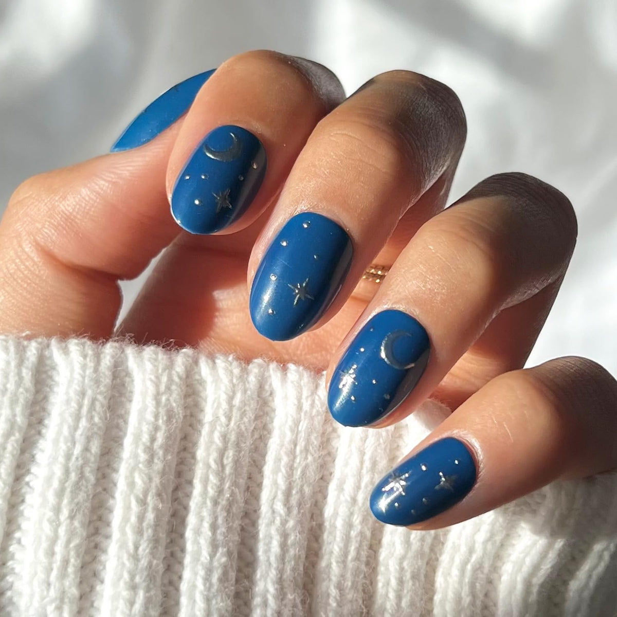 Glamnetic Luna Lovegood nails with blue moon and stars 3D graphic for celestial style