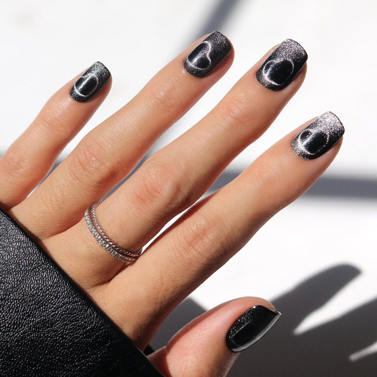 Glamnetic Midnight Romance nails with magnetic cat-eye design for a dazzling night-out look.